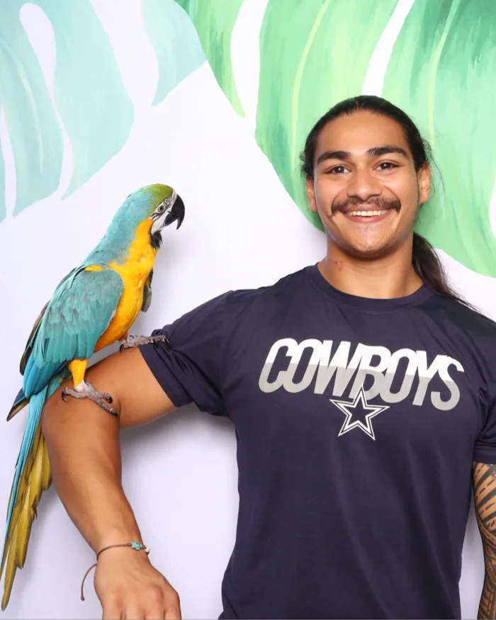 Guest with parrot photo booth Virginia Beach